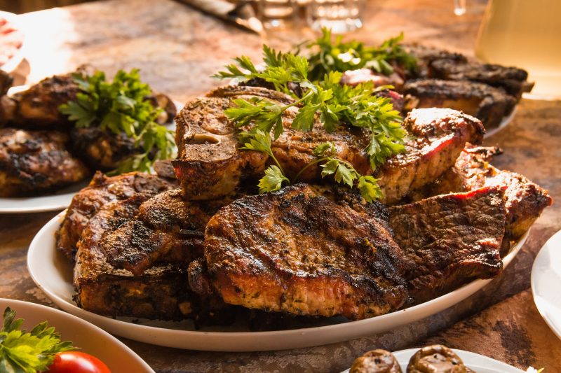 Steaks in a dish on the table