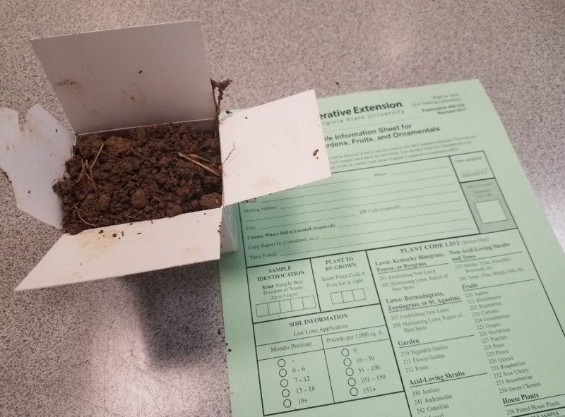 Photo of a soil test box and form from Virginia Cooperative Extension